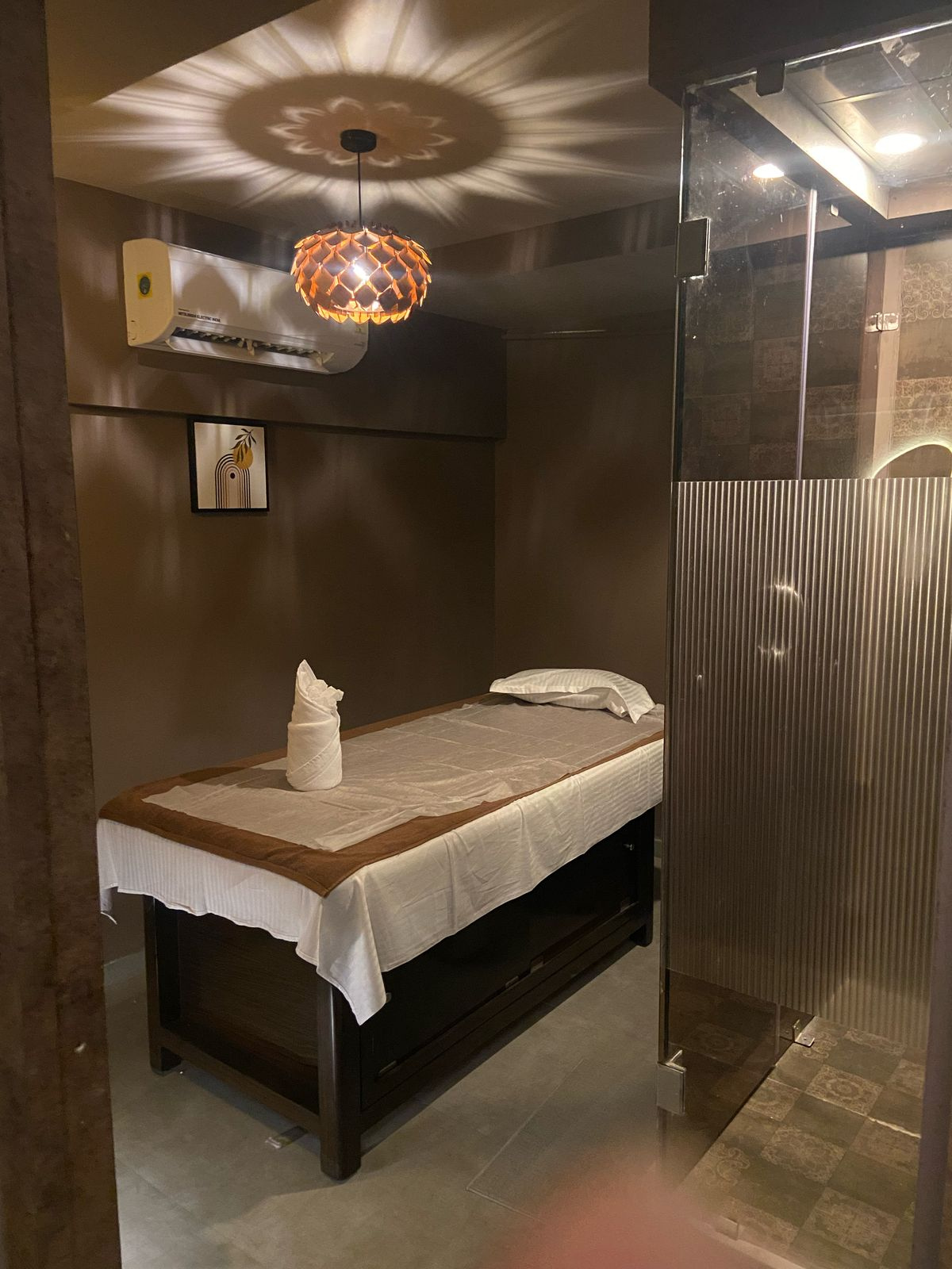 Modern spa room at Spa Villawith soft lighting and comfortable massage tables